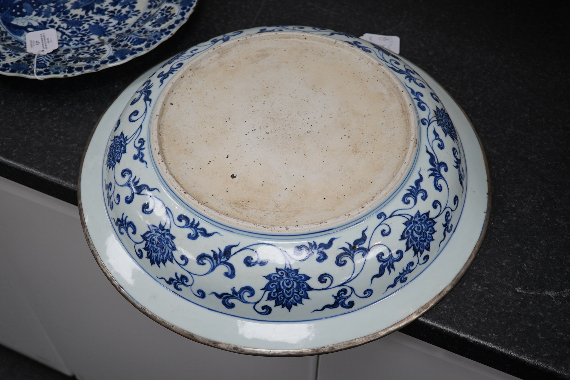 A large Chinese Ming style blue and white dish, possibly 18th century